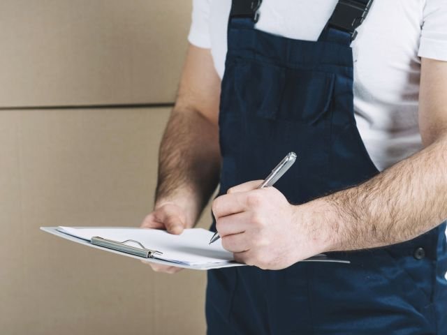 maintenance guy with checklist